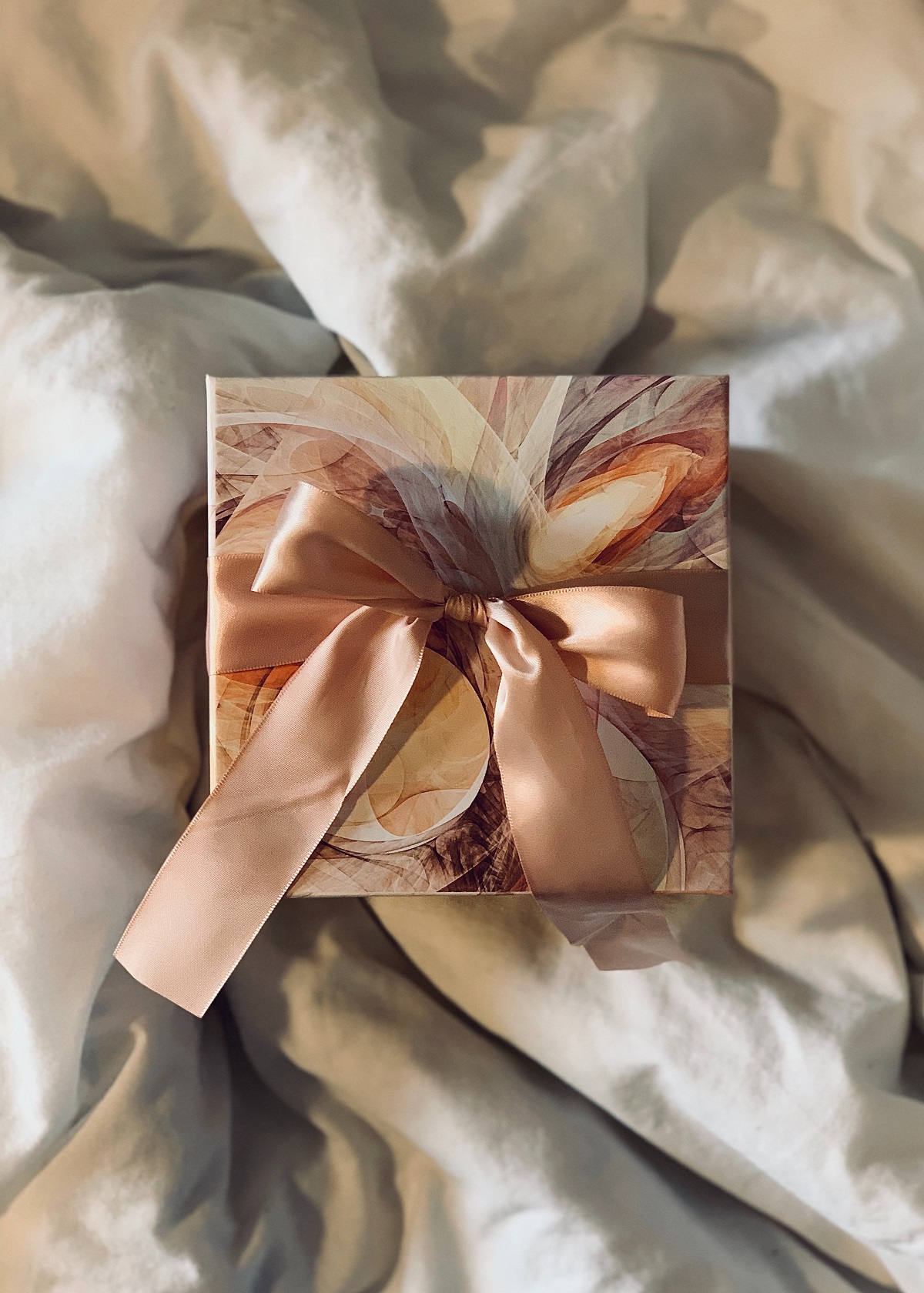 A beautifully wrapped gift box adorned with a colorful ribbon and bow, symbolizing the art of thoughtful gifting